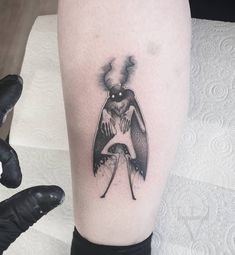 a person with a tattoo on their leg