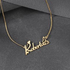 Material: Copper. Color: Gold.  Process: Gold plated.  Chain Length: 14",16",18",20",22".  Recipient: Women, Mom, Wife, Girl Friend, Children, Family.  Product Type: Personalized Jewelry.  Gift Type: Name Necklace.  Occasions: Valentine's Day, Mother's Day, Christmas, Birthday, etc.  Necklace Type: Name Necklace.  Brand: Silviax Jewelry. Item: 2023NE0377 Gold Chain Name Necklace For Gift, Rose Gold Name Necklace In Metal, Rose Gold Metal Necklace With Name Detail, Metal Name Necklace For Gift, Metal Name Necklace Perfect As A Gift, Metal Name Necklace As Gift, Metal Name Necklace With Clavicle Chain For Gifts, Adjustable Chain Metal Name Necklace For Anniversary, Metal Name Necklace With Adjustable Chain For Anniversary