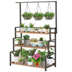 PRICES MAY VARY. Super Sturdy and Durable, 2 tier hanging plant shelf is combining a pinewood and a painting iron frame brings the strength of 2 materials into full play which is heat and moisture resistant, with no shrinkage, no warpage, and cracking. The wood is high-temperature carbonized. And supported by a sturdy iron frame, super sturdy and durable than wood plant stand. Dimensions: 23.6''L x 13.4''W x 52.8''H Hanging Your Favorite Plants, Sturdy plant display shelf design with a hanging i Outdoor Shelf, Plants Shelf, Pot Organizer, Hanging Plant Stand, Wood Plants, Plant Stand With Wheels, Outdoor Shelves, Plant Rack, Pot Organization