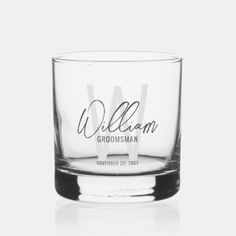 a clear glass with the name william groomsman on it's front and side