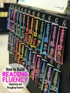 the back of a book shelf filled with books and magnets that read how to build reading flueny