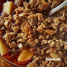 a bowl filled with apple crumbled oatmeal