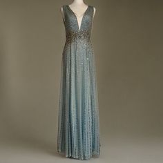 New Condition Store Display! Jenny Packham "Meredith" Gown Embellished In Allover Crystal And Sequin Beading V Neckline; Plunging Illusion Sleeveless A-Line Silhouette Floor Length Invisible Back Zip Viscose/Polyester/Elastane Imported. Luxury Sleeveless Blue Evening Dress, Jenny Packham Dresses, Celestial Blue, Sleeveless Gown, Jenny Packham, Sequin Beading, Store Display, Floor Length, Blue Dresses