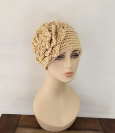 Crochet women's hat with large flower.  Flower is about 7". It's simple yet chic and comfortable.  I make the hats fits to average adult head 22" but if you need different size please leave a note at the check out what size you want.  The color in the picture is dark cream.  If you want flower 2 different colors you can leave a note at the check out what colors. Always smoke, pet free environment. Accessories Crochet, Crochet Woman, Winter Hats For Women, Daytona Beach, Crochet Beanie, Large Flowers, Winter Hat, Hats For Women, Different Colors