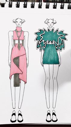 a drawing of two women's dresses on a notepad, one in pink and the other in green