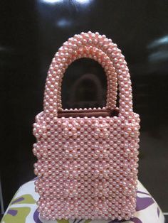 Peach Pearl beaded bag Rectangular Bags With Pearl Handle For Daily Use, Daily Use Square Shoulder Bag With Pearl Handle, Square Shoulder Bag With Pearl Handle For Daily Use, Square Shoulder Bag With Pearl Handle, Tote Bags With Pearl Handle, Square Shopping Bag With Pearl Handle, Square Shopping Bags With Pearl Handle, Rectangular Shoulder Bag With Pearl Handle For Shopping, Daily Use Tote Bag With Pearl Handle