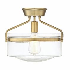 a semi flush ceiling light with an open glass bowl on the bottom and a brass finish