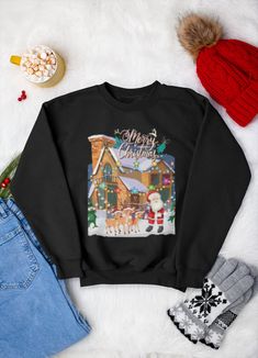 "Merry Christmas Sweatshirt | Cute Santa Claus Sweatshirt | Cookie House Sweatshirt | Gingerbread House Sweatshirt | Cute Winter Sweater ⭐ABOUT PRODUCT ⭐ Celebrate Christmas in style with our 'Merry Christmas' sweatshirt! This sweatshirt features a charming Santa Claus house and his faithful reindeer, perfect for adding a festive touch to your wardrobe. It is made with a blend of 50% polyester and 50% cotton, which makes it soft, comfortable and perfect to keep you warm during the holidays. Avai Black Christmas Sweatshirt, Christmas Sweatshirt Ideas, Sweatshirts Collection, Cute Winter Sweaters, Sweatshirt Ideas, Cute Christmas Sweater, Christmas Crewneck Sweatshirt, Cookie House, Christmas Crewneck