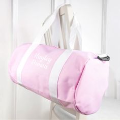 This stylish canvas bag that doubles as a gym kit bag or a handy carry-on for the little ones, has a roomy main compartment in which their football kits and shoes can be stored into. There's a small outside pocket that can store keys to lockers, their phones or pocket change.

The white shoulder strap that stretches from 70 cm to 120 cm, and is 4 cm wide, can help the bag alternate between being hand-held and slung over their shoulder, while ensuring that it's never too heavy to carry.

Personalise it with their name and surname to make it their very own - and potentially, to stop some friendly sibling rivalry too! Three Characters, Cream Bag, Pink Gym, Gym Kit, Kids Gym, Cream Bags, Sibling Rivalry, Sports Bags Gym, 40th Gifts