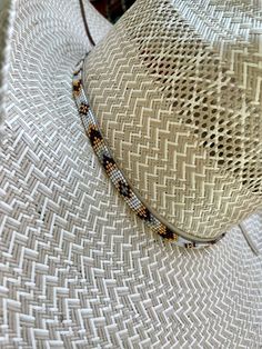 "1/4\" wide All bead work is beaded with 10lb extreme braided nylon line. All hat bands are finished at 23\" with glued than sewed down leather ends and an adjustable leather tie." Cowboy Hat Bands, Beaded Hat Bands, Bead Creations, Hat Bands, Gold Hats, Beaded Hat, Bead Projects, Leather Tie, Beaded Cuff Bracelet