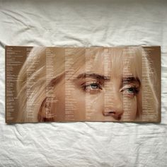 a woman's face is shown on a sheet with words written all over it