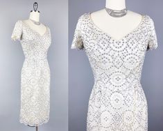 Exquisite original 1950s cocktail dress by high-end designer Edith Small, in dove grey lace over white silk satin. The lace is elaborately studded with hundreds of prong-set rhinestones in geometrical shapes following the lines of the lace. I wasn't able to capture in photographs just how sparkly this dress is in person! It's also really heavy - the lace is absolutely loaded with rhinestones and the silk satin is heavy and fluid.   Edith Small was considered a peer of famous designers Gilbert Ad 1950s Cocktail Dress, Life Styles, Designer Cocktail Dress, Grey Lace, Vintage 1950s Dresses, Famous Designers, 1950s Dress, Dove Grey, White Silk