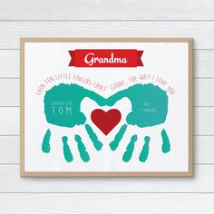 a card with two hands making a heart and the words grandma written in red on it