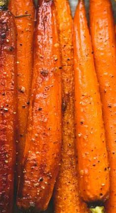 some carrots are sitting together on the table