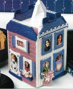 a crocheted tissue box with pictures of people on the front and side of it