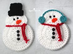 two crocheted snowmen with hats and scarves on their heads are shown