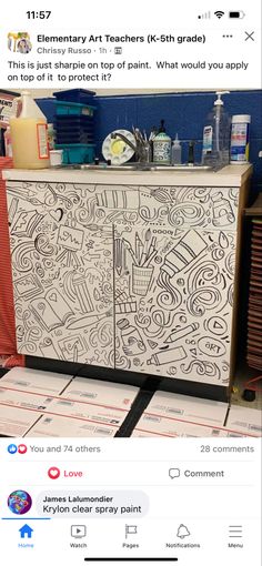 an image of a cabinet that has been painted with black and white designs on it