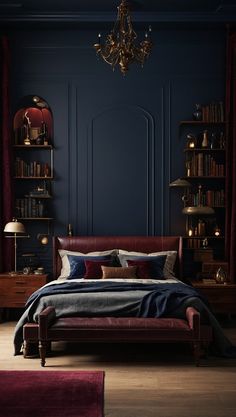 a bedroom with dark blue walls and red curtains, an upholstered bed, two nightstands and a chandelier