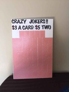 a sign that says crazy jokers $ 3 a card $ 2 two on it