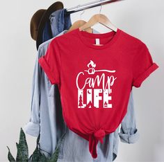 Camp Life Shirt, Camping Life Tshirt,Camper Gift,Happy Camper Shirt,Camp Adventure Squad Tshirt,Matching Friends Camping Tee,Camp Fire Shirt 👉How Do I Order👈 1️⃣ Please review all the information provided before placing an order 2️⃣ Select the shirt size using the drop down menu. 3️⃣ Select the color of the shirt using the following drop down menu. * * Different styles of shirts may have different shades of same color choice due to different manufacturer brands. * * For this reason, we recomme Casual Red T-shirt For Outdoor Activities, Red Short Sleeve T-shirt For Outdoors, Red Cotton Tops For Outdoor Activities, Matching Friends, Friends Camping, Happy Camper Shirt, Fire Shirt, Camping Tee, Camper Shirt