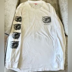 Supreme M.C. Escher Eye Long Sleeve Tee White Medium From Ss17 Collection. Rare And Out Of Stock Everywhere!! Worn And Washed Less Than 5 Times, Still Like Brand New. 100% Cotton. Bundle With My Other Supreme Items For A Deal! Summer Long Sleeve Shirt With Logo Print, White Long Sleeve Top With Front Print, White Graphic Design Shirt For Spring, Long Sleeve Tees, Tee Shirts, Mens Shirts, Man Shop, Brand New, White