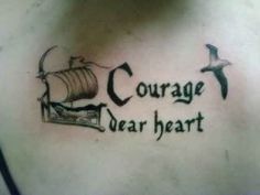 a man with a tattoo on his chest that says courage near heart and an image of a ship