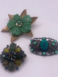 Vintage green scatter pin set  Over an inch longBrooch pin set  All jewelry is shipped free in the US in a nice gift box.   Check out our THOUSANDS of great reviews Elegant Green Pins For Gifts, Vintage Green Brooch Jewelry, Victorian Green Collectible Brooches, Mid-century Brooch Pins For Gifts, Mid-century Green Brooches For Formal Occasions, Mid-century Green Brooch For Formal Occasions, Retro Green Brooch Jewelry, Green Mid-century Style Brooches For Formal Occasions, Mid-century Green Collectible Jewelry