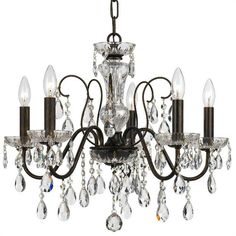 a chandelier with crystal drops hanging from it's center and four lights on each side