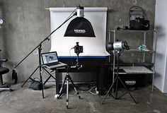 a photo studio set up with lighting equipment