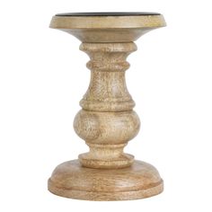 a wooden pedestal with a glass top on it's base, against a white background