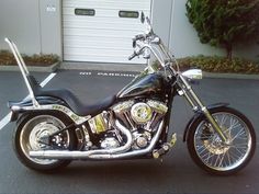 a black and chrome motorcycle parked in a parking lot