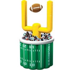 an inflatable football stadium cooler filled with confetti and candy for the super bowl