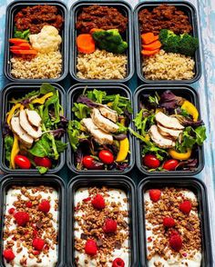 six plastic containers filled with food on top of a blue table covered in rice and veggies