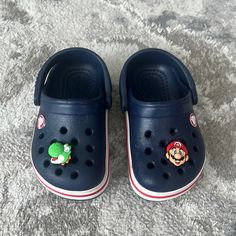 Dark Blue Toddler Crocs With Two Additional Mario Pins. Size 5. Like Brand New! Perfect As First Walking Shoes. Park Gunhoo, Crocs Outfit, Toddler Crocs, Crocs Crocband, Indian Aesthetic, Baby Walker, Baby Boy Shoes, Crocs Shoes, Walking Shoes