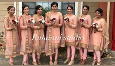 the bridesmaids are all dressed in pink