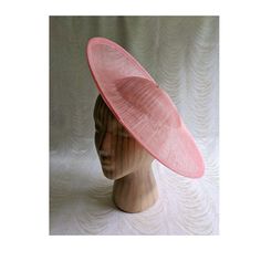 "One contoured saucer with a slight upturned brim hat sinamay straw fascinator / hat base in hot coral that measures approximately 13\" in diameter. The base is contoured to fit against the head. The edges of the brim are finished in sinamay. The multi-layer stiffened sinamay straw has a great sturdy weave and provides excellent support for your millinery creations. This is NOT a finished hat and will not stay on your head unless you add a head band to wear. Add embellishments of your choice. A Fitted Sinamay Boater Hat With Curved Brim, Fitted Sinamay Boater Hat With Flat Brim, Fitted Sinamay Boater Hat With Short Brim, Fitted Sinamay Brimmed Top Hat, Sinamay Fascinator Hat For Spring, Spring Sinamay Fascinator Hat, Spring Sinamay Fascinator, Summer Fascinator With Flat Brim, Spring Fascinator With Sinamay And Curved Brim