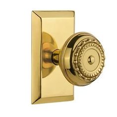 an image of a golden door handle