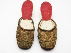 "Antique embroidered mules, antique Ottoman embroidered mules, bronze color metal threads embroidery, antique Ottoman embroidered slippers. MEASURE: 8 1/2\" by 3\" (21.6 cm by 7.6 cm), the heel is 2\" (5.1 cm) high. DESCRIPTION: Wonderful antique Ottoman mules, dating to the early 1800's, with metal threads embroideries in bronze color and red, spool heels in gilt wood. CONDITION: These antique Ottoman mules are in good condition for their age, there are some lost threads and some lacks of gilt Traditional Closed Toe Mules For Festivals, Traditional Closed Toe Mules For Festive Occasions, Traditional Embroidered Closed Toe Mules, Embroidered Slippers, Victorian Shoes, Antique Ottoman, Clogs And Mules, Spool Heel, Prada Shoes