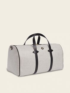 Paravel | Main Line Duffle Bag | Banana Republic Practical Rectangular Travel Bag With Leather Handles, Everyday Rectangular Canvas Luggage, Practical Travel Bag With Leather Handles, Functional Duffle Bag With Dust Bag For Travel, Modern Travel Bag With Dust Bag Included, Modern Travel Bag With Dust Bag, Everyday Duffle Bag With Leather Trim, Functional Rectangular Travel Bag With Canvas Lining, Rectangular Travel Bag With Canvas Lining For Overnight Trips