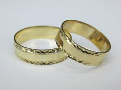 Handmade set of 2 wedding bands in solid 14k gold with diamond cut designs on the edges. Ring size is adjustable, please note the size in the personalization section of checkout. set de 2 anillos para el y para ella en oro de 14k garantisado hecho a mano. Yellow Gold Diamond Cut Bridal Set For Promise Ring, Engraved Round Band Couple Rings For Wedding, Classic 14k Gold Couple Rings For Wedding, Yellow Gold Diamond Cut Bridal Set For Wedding, Classic Couple Rings Stamped 14k For Wedding, Classic 14k Stamped Couple Rings For Wedding, Heirloom Diamond Cut Couple Rings For Anniversary, Formal Couple Rings Stamped 14k, Stamped 14k Engraved Ring For Wedding