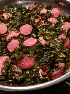 sausage and greens in a pan on the stove