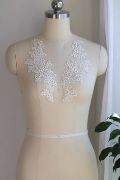 Ivory Lace Applique, Wedding Dress Lace Applique, Bridal Lace Applique, Lace Applique, Bridal Veil Lace Applique, Corded Lace Applique Price is for 1 pair Color: Ivory Features: Made by Rayon Corded Lace Applique Mirrored Pair Unique leaves 🍃 pattern Great for making bridal gowns, bridal veils, garters, dancing costumes and other fashion designs. Shipping method: The default shipping method is by USPS first class, especially for the FREE SHIPPING items. Please choose priority or express mail if Applique Lace, Dancing Costumes, Lace Applique Wedding Dress, Veil Lace, Bridal Gowns Mermaid, Wedding Dress Lace, Bridal Dresses Lace, Applique Wedding, Bridal Veils