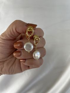 Looking for simple but gorgeous pearl earrings tonight your bridesmaids on your wedding day? These coin pearl drop earrings are simple, light and yet elegant! Perfect  gift for your bridesmaid or for anyone you care about!  Bundle to save more! One pair: $39.95 Two pairs: $59.95, $29.97 a pair Three pairs: $69.95, $23.32 a pair Will come with a pink sliding gift box with a pretty pink soft jewelry pouch free, ready for gift giving! You can't go wrong with this simple jewelry gifts for her! The coin pearls are AAA quality, super lustrous, gorgeous! The coin dangling pearls are genuine, white, super lustrous, AAA quality, approx measurements 12mm to 14mm, carefully wire wrapped in gold filled wires. The ear findings are all real gold plated, won't easily tarnish, brass body. Will come with l Drop Gold Earrings, Stacking Earrings, Simple Pearl Earrings, Soft Jewelry, Coin Pearl Earrings, Earrings Pearl Drop, Bridesmaid Pearl Earrings, Bridesmaid Pearls, Simple Pearl