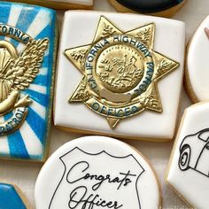 decorated cookies with the words congratulations officers written on them