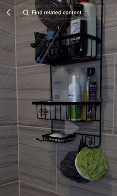 there is a shelf in the bathroom with many items on it