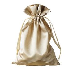 a gold satin bag on a white background