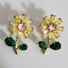 These Are Stunning In Person! These Have So Much Sparkle! They Are Of High Quality And Very Well Made, They Are Stamped 925 On The Posts, I Tried To Get A Photo Of It. These Are Gold Vermeil, Sterling Under The Gold. The Colors Are Amazing Together! The Pink And Yellow Daisy Bloom With The Emerald Green Petals Is Just Gorgeous! I Would Wear These For Any Formal Event Even A Wedding! Perfect Gift For Bride To Give Bridesmaid. These Are 1" Tall. Not Too Heavy But Not Cheap Lightweight Either. Thes