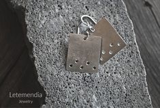 "Hand forged and hammered rectangle earrings made with sterling silver 925, with a few perforations for added interest. Ear wires made with Sterling Silver Approx. 1.25\" (3.5 cm) long. The rectangles are approx. 22mm x 18mm. Weight of one earring: less than 1 gram. Choose a finish from the drop down menu as follows: -Polished -Oxidized/Unpolished -Oxidized/Polished You will receive your earrings in an organza pouch. FREE WORLDWIDE SHIPPING ON ALL MY ITEMS!  ♦  ♦  ♦  Instagram: letemendia_jewelr Pearl Cluster Necklace, Oxidized Silver Necklace, Organza Pouch, Rectangle Earrings, Handmade Jewel, Jade Earrings, Pearl Cluster, Earrings Geometric, Cluster Necklace