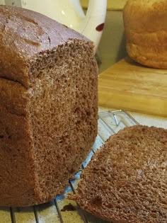 a loaf of bread sitting on top of a cooling rack