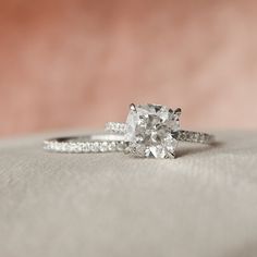 an engagement ring with two diamonds on it